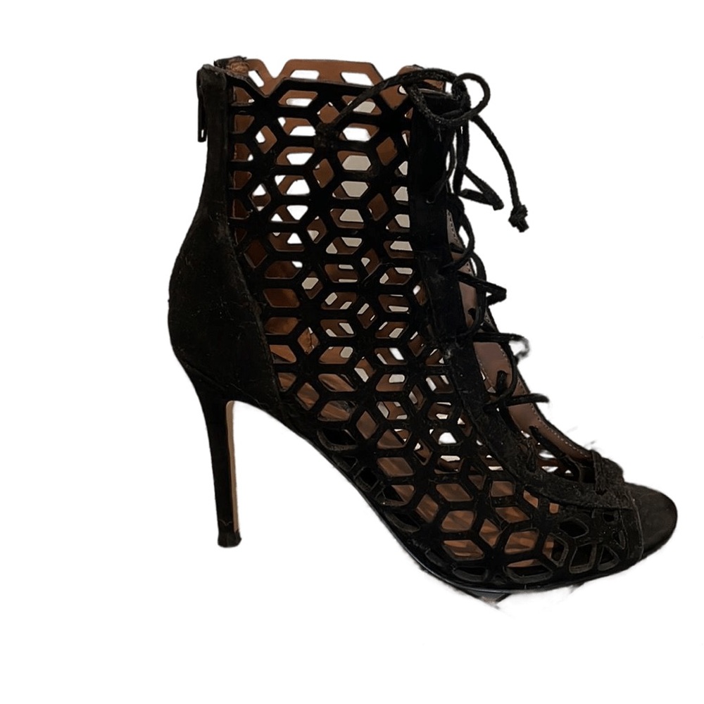 Lazer cut leather lace up bootie heals